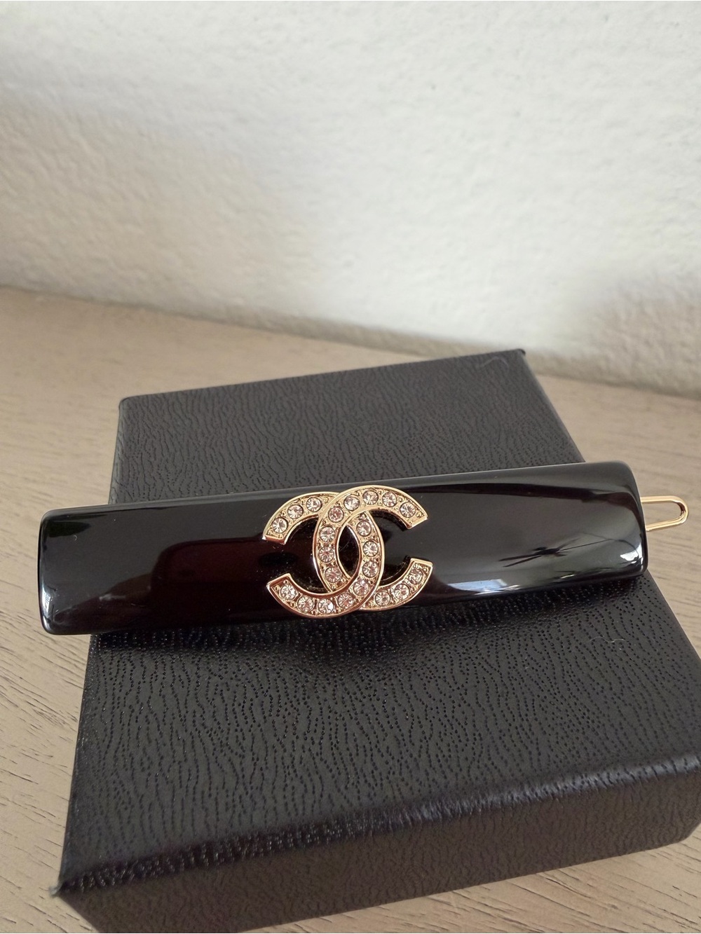 CHANEL Black Resin Hair Clip with Gold Crystal CC Logo - Picture 2 of 7